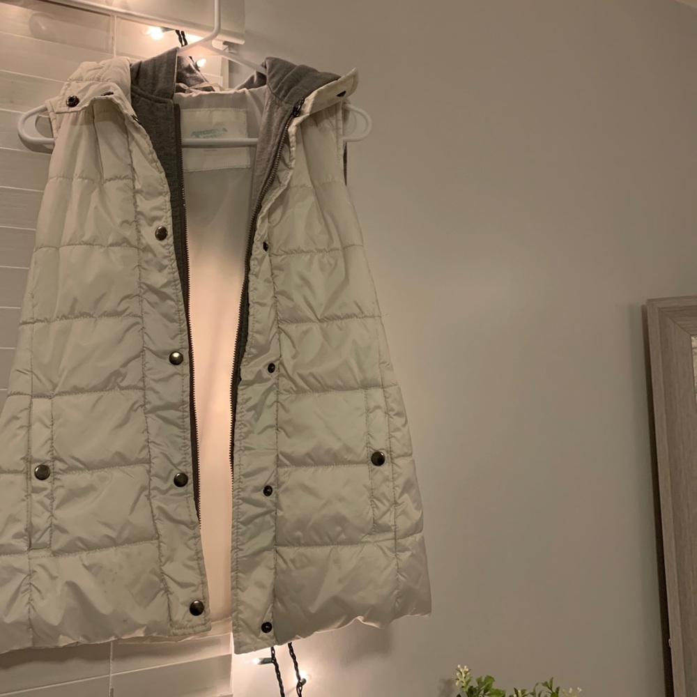 White hooded vest